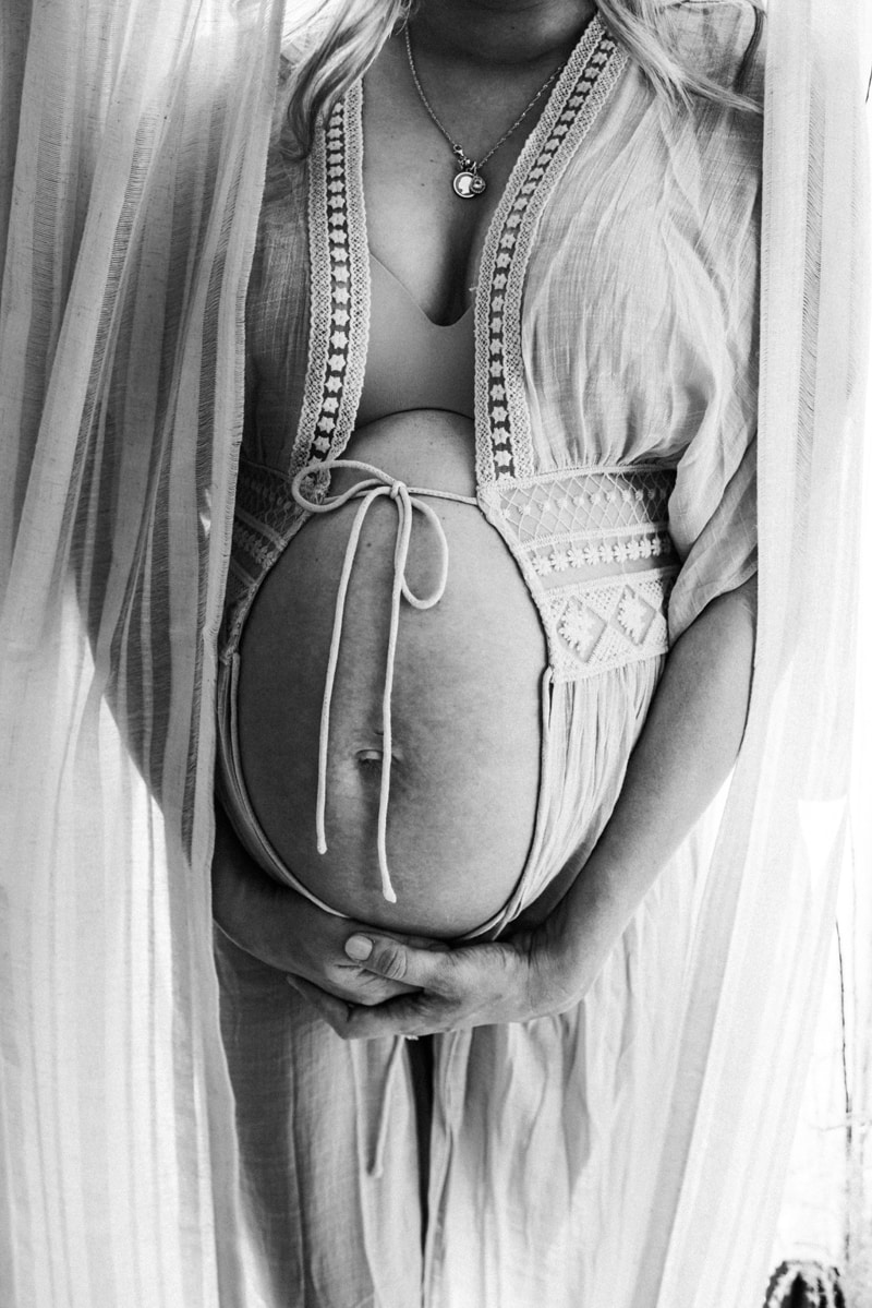 Bay Area Maternity Photography, black and white of mother holding her belly