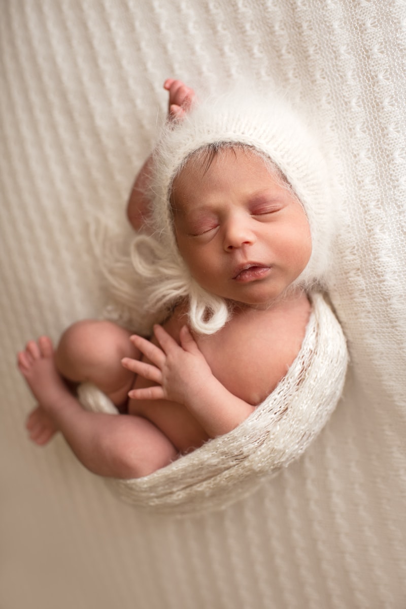 Bay Area Newborn Photography, baby asleep on woven blanket