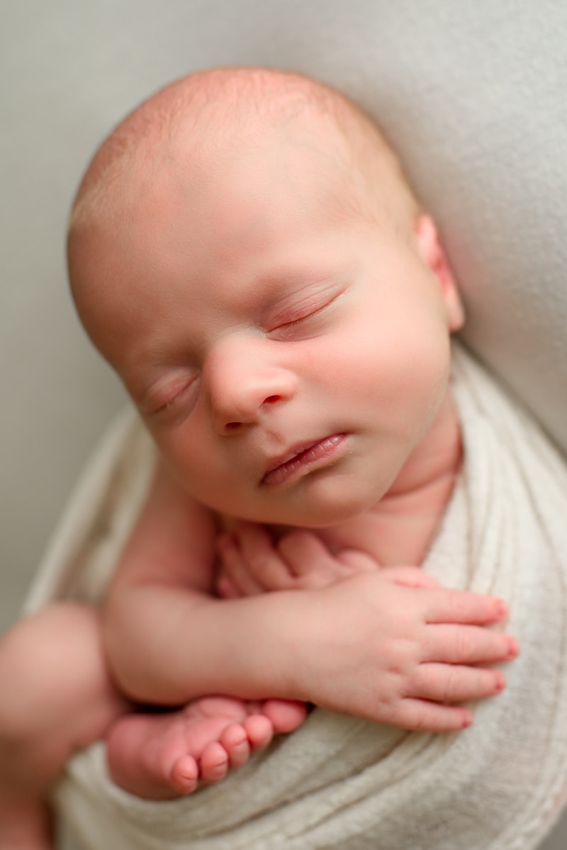 Bay Area Newborn Photography, asleep wrapped in white wool blanket